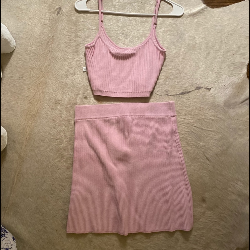 Pink Set, the skirt is mid.